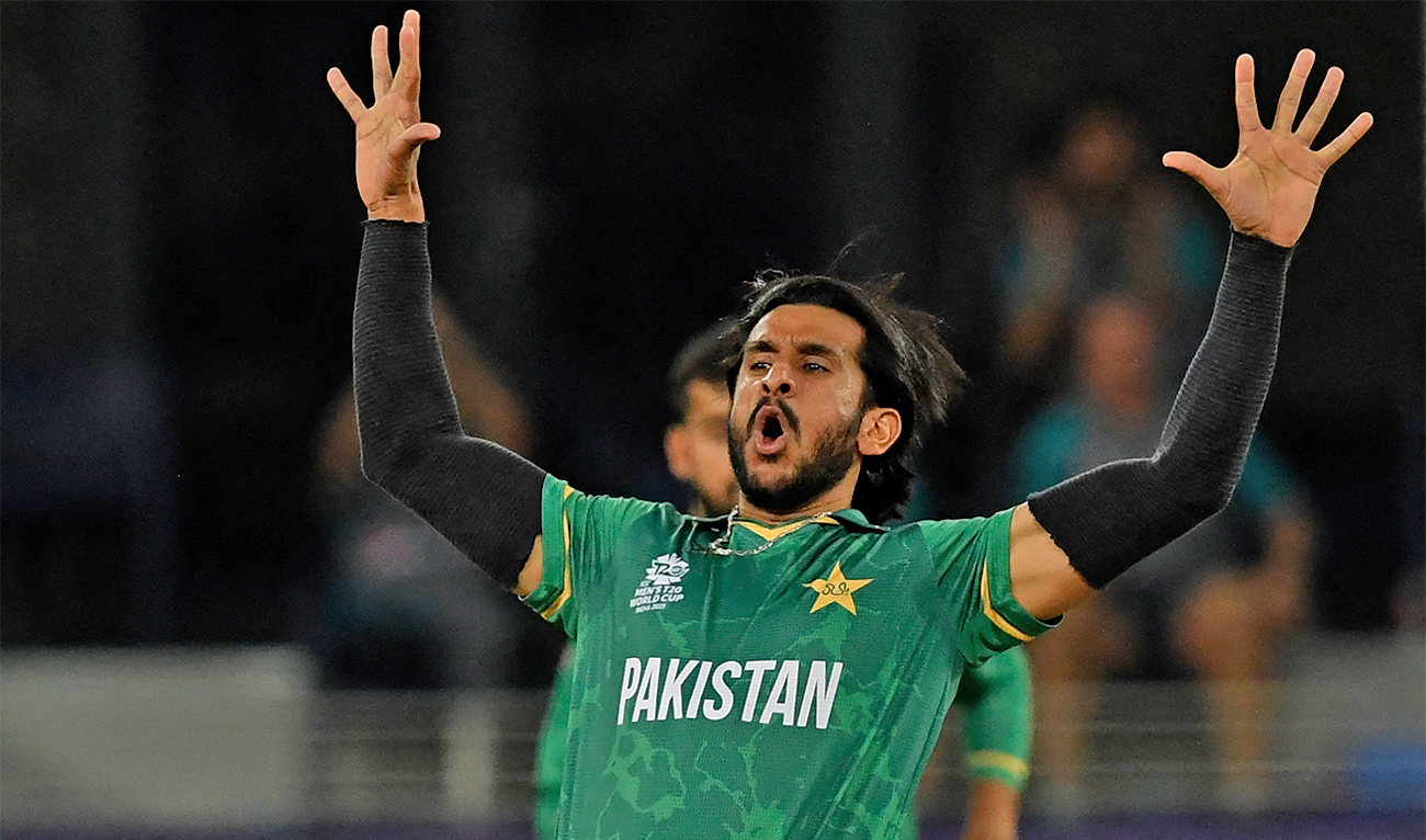 Pakistan's Hasan Ali celebrates after taking the wicket of Afghanistan's Rahmanullah Gurbaz (not pictured) during the ICC men’s Twenty20 World Cup cricket match between Afghanistan and Pakistan at the Dubai International Cricket Stadium in Dubai on October 29, 2021. (AFP/File)