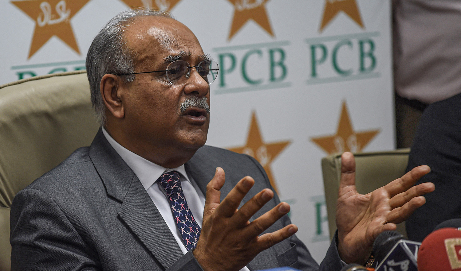 Chairman of Pakistan Cricket Board (PCB) Najam Sethi gestures as he addresses a news conference at the National Stadium in Karachi on October 18, 2017. (AFP/File)