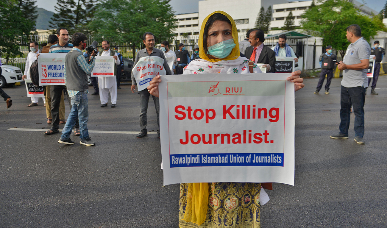 Journalists stand in a demonstration to mark the World Press Freedom Day in Islamabad, Pakistan, on May 3, 2020. (AFP/File)