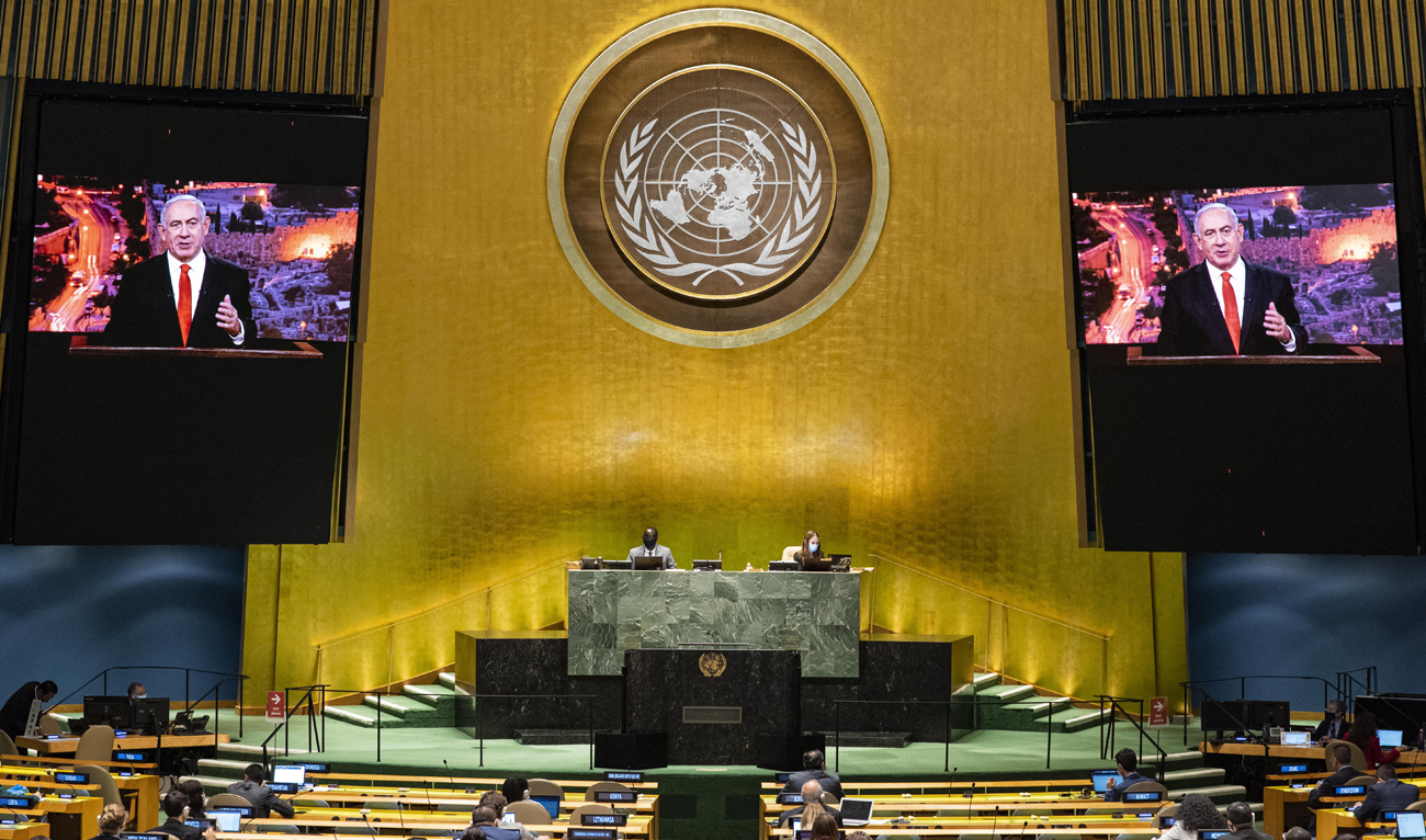 This UN handout photo shows Benjamin Netanyahu (on screens), Prime Minister of Israel during the 75th session of the United Nations General Assembly, on September 29, 2020, in New York. (Photo courtesy: AFP/File)