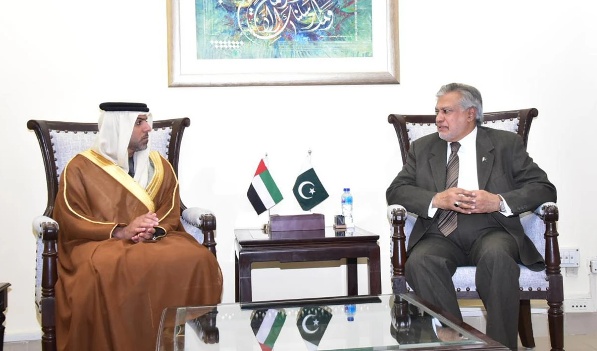 UAE Ambassador Hamad Obaid Al-Zaabi, left, meets Pakistan's finance minister Ishaq Dar at Finance Division in Islamabad on December 1, 2022. (Photo courtesy: @FinMinistryPak/Twitter)