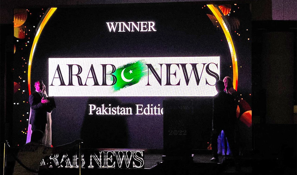 Arab News’ Asia bureau chief, Baker Atyani (right) receives award as Arab News Pakistan wins ‘Edition of the Year’ award at AN General Assembly in Dubai, UAE, on December 3, 2022. (AN Photo)
