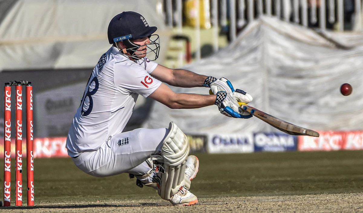 England's Harry Brook falls as he tries to play a shot during the first Test match of the series against in Rawalpindi on December 4, 2022. (REUTERS)
