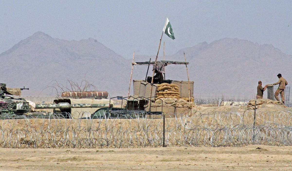 Pakistan's soldiers stand guard at a checkpoint at the Pakistan-Afghan border in Chaman on February 26, 2022. (AFP/File)