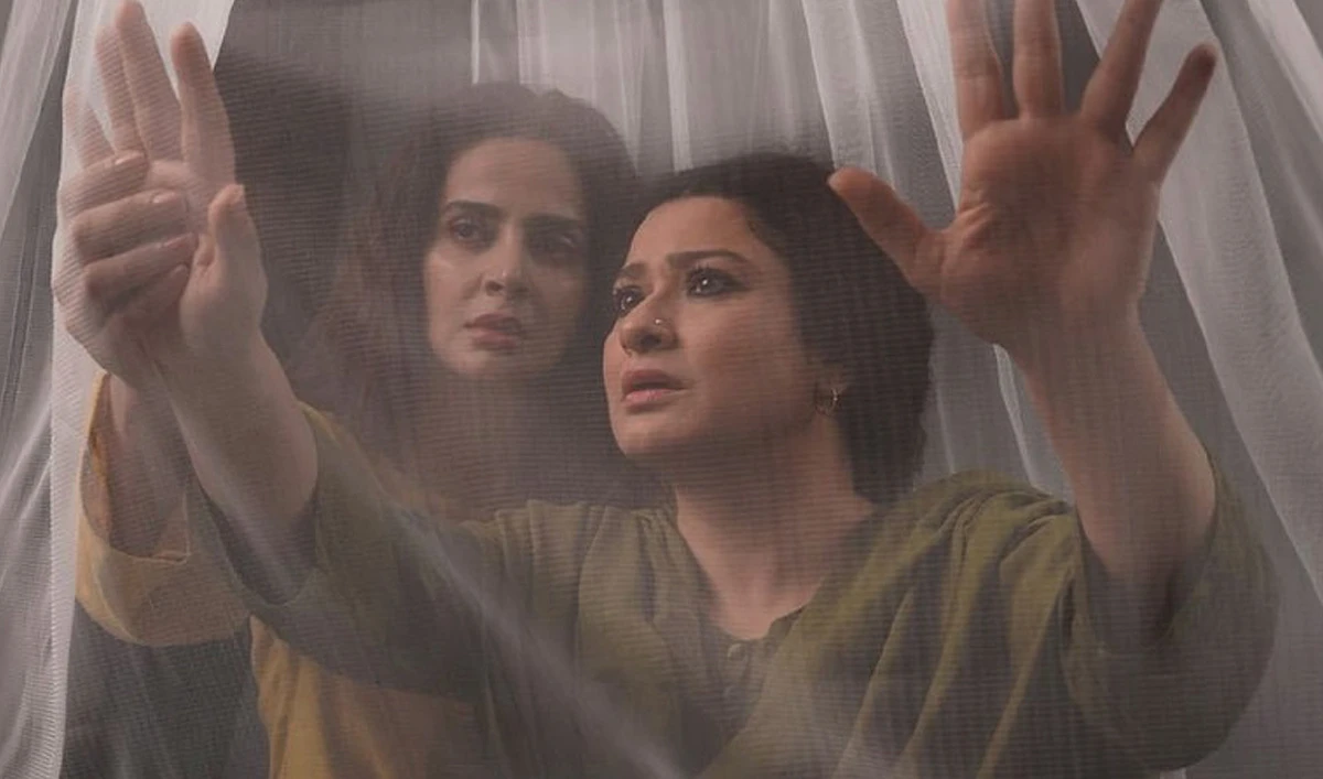 This screengrab, taken on December 14, 2022, from the trailer of the Pakistani movie "Kamli" features actors Sania Saeed (right) and Saba Qamar (left). (Photo courtesy: Khoosat Films)
