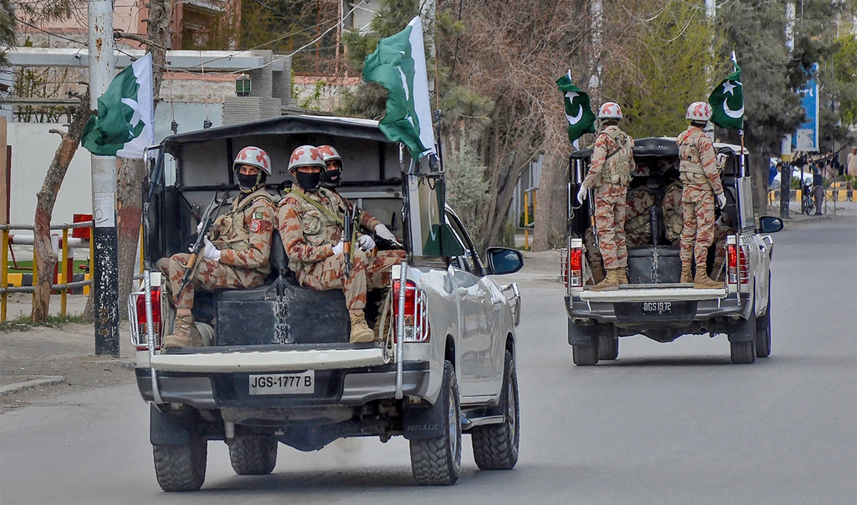 Security personnel patrol with vehicles in Quetta, Pakistan on March 25, 2020. (AFP/File)