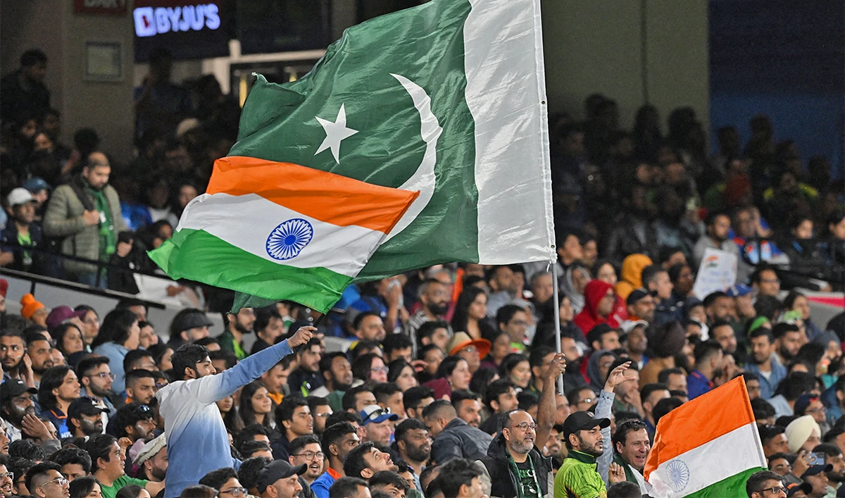 Pakistan and Indian fans wave their national flags during the ICC men's Twenty20 World Cup 2022 cricket match between India and Pakistan at Melbourne Cricket Ground (MCG) in Melbourne on October 23, 2022. (AFP/File)