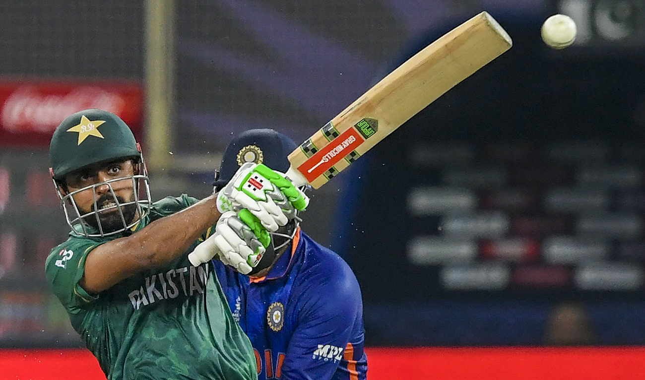 In this file photo taken on October 24, 2021, Pakistan's captain Babar Azam plays a shot during the ICC men’s Twenty20 World Cup cricket match between India and Pakistan at the Dubai International Cricket Stadium in Dubai. (Photo courtesy: AFP/File)
