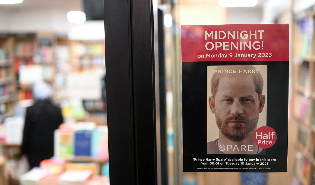 A poster advertising the forthcoming publication of the book 'Spare' by Britain's Prince Harry, Duke of Sussex, is pictured in the window of a book store in London on January 6, 2023. (Photo courtesy: AFP)