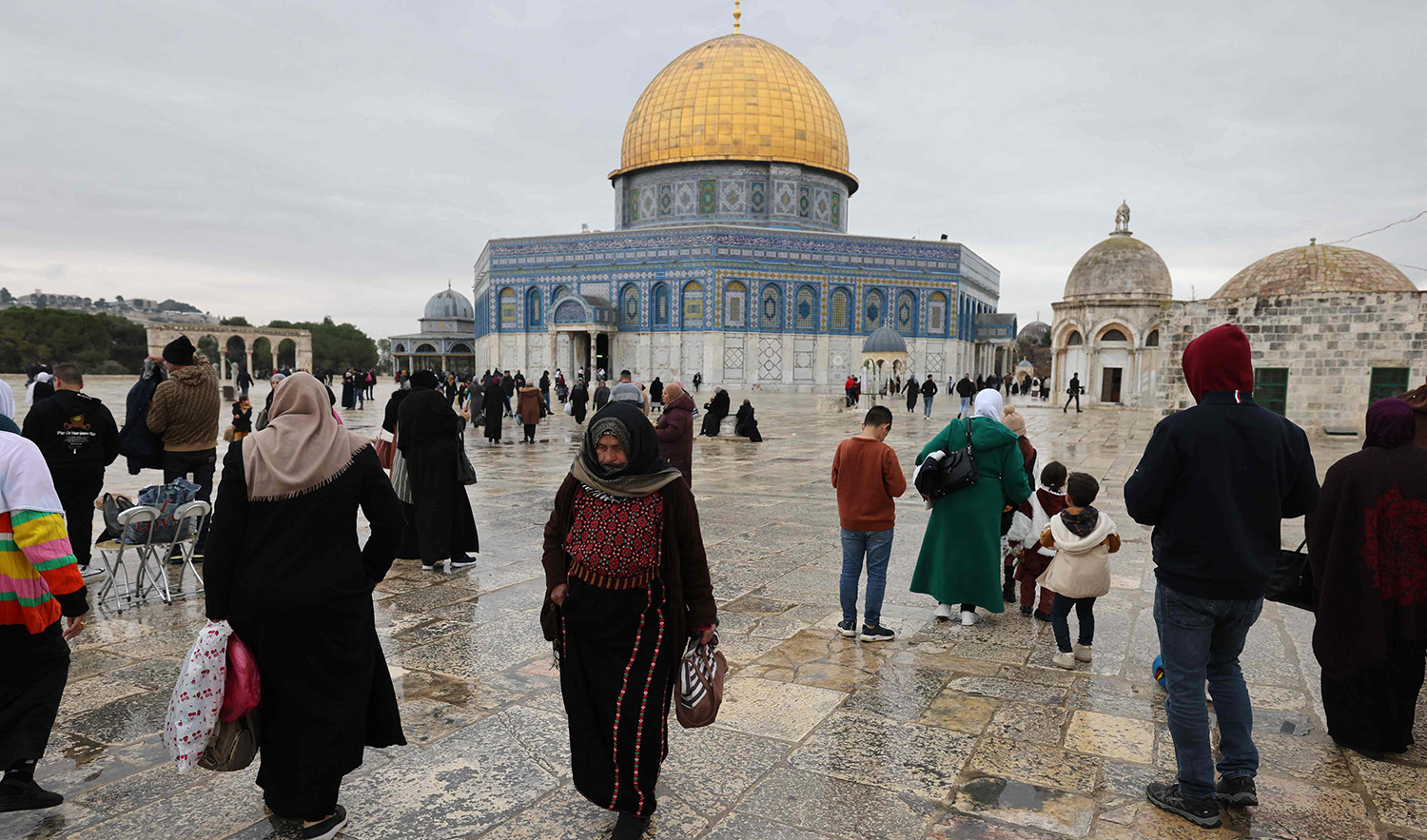 Palestinians gather in the Al-Aqsa mosques compound after the Friday noon prayer in Jerusalem on January 6, 2023. (AFP)