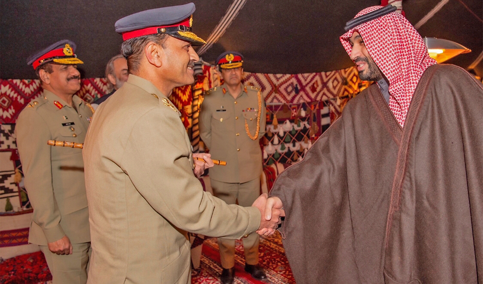 Saudi Crown Prince Mohammed bin Salman (right) and Pakistan’s army chief, General Syed Asim Munir, hold a meeting in AlUla, Saudi Arabia, on January 9, 2022. (Saudi Press Agency)
