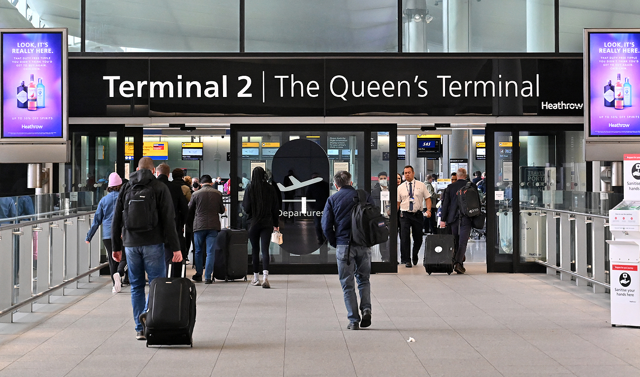 In this file photo taken on April 6, 2022, travellers arrive at Terminal 2 of London Heathrow Airport in west London. (Photo courtesy: AFP)