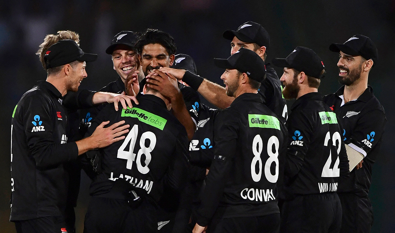 New Zealand's players celebrate after the dismissal of Pakistan's captain Babar Azam (not pictured) during the second one-day international (ODI) cricket match between Pakistan and New Zealand at the National Stadium in Karachi on January 11, 2023. (Photo courtesy: AFP)