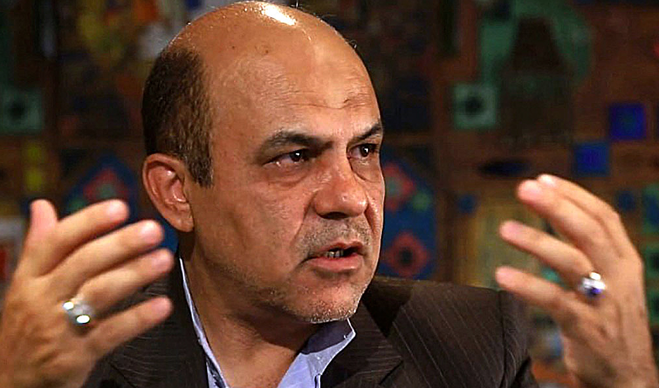 An undated handout picture provided by Khabar Online news agency shows, former Iranian deputy of defence minister, British-Iranian national Alireza Akbari, during an interview in Tehran. (Photo courtesy: AFP)