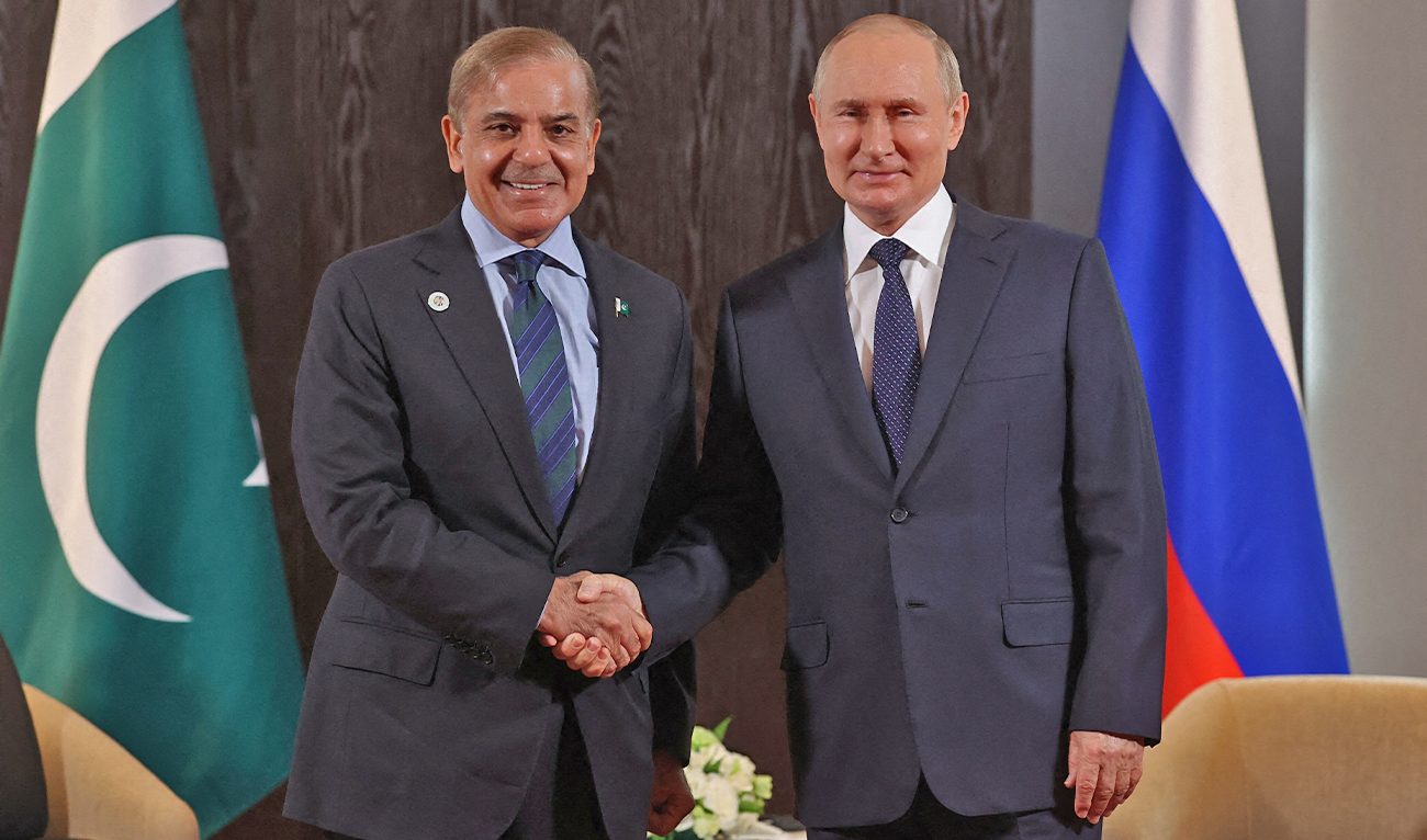Russian President Vladimir Putin meets with Prime Minister of Pakistan Shehbaz Sharif on the sidelines of the Shanghai Cooperation Organisation (SCO) leaders' summit in Samarkand on September 15, 2022. (AFP/File)