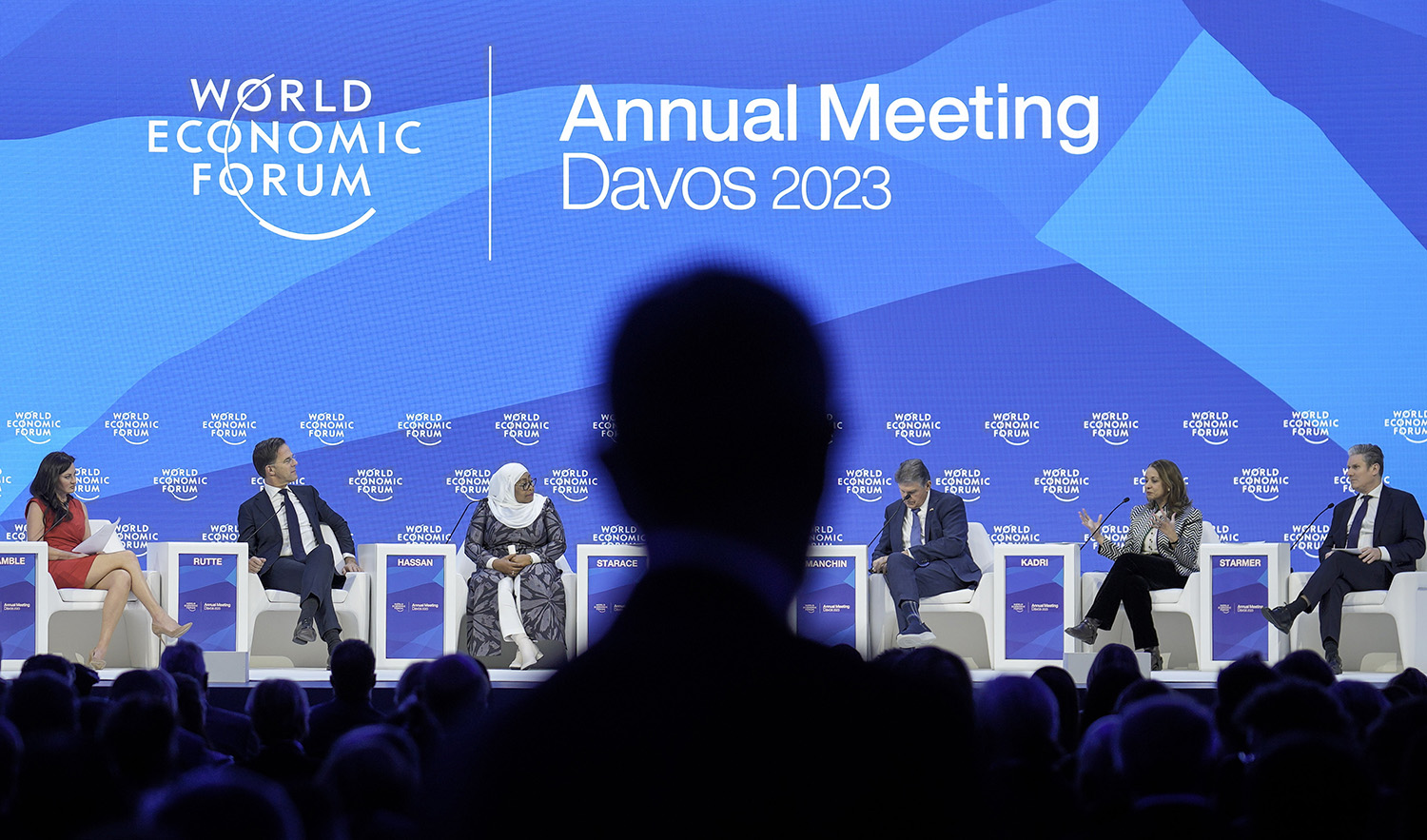 Panelists hold discussions on the podium at the World Economic Forum in Davos, Switzerland on January 19, 2023. (AP)