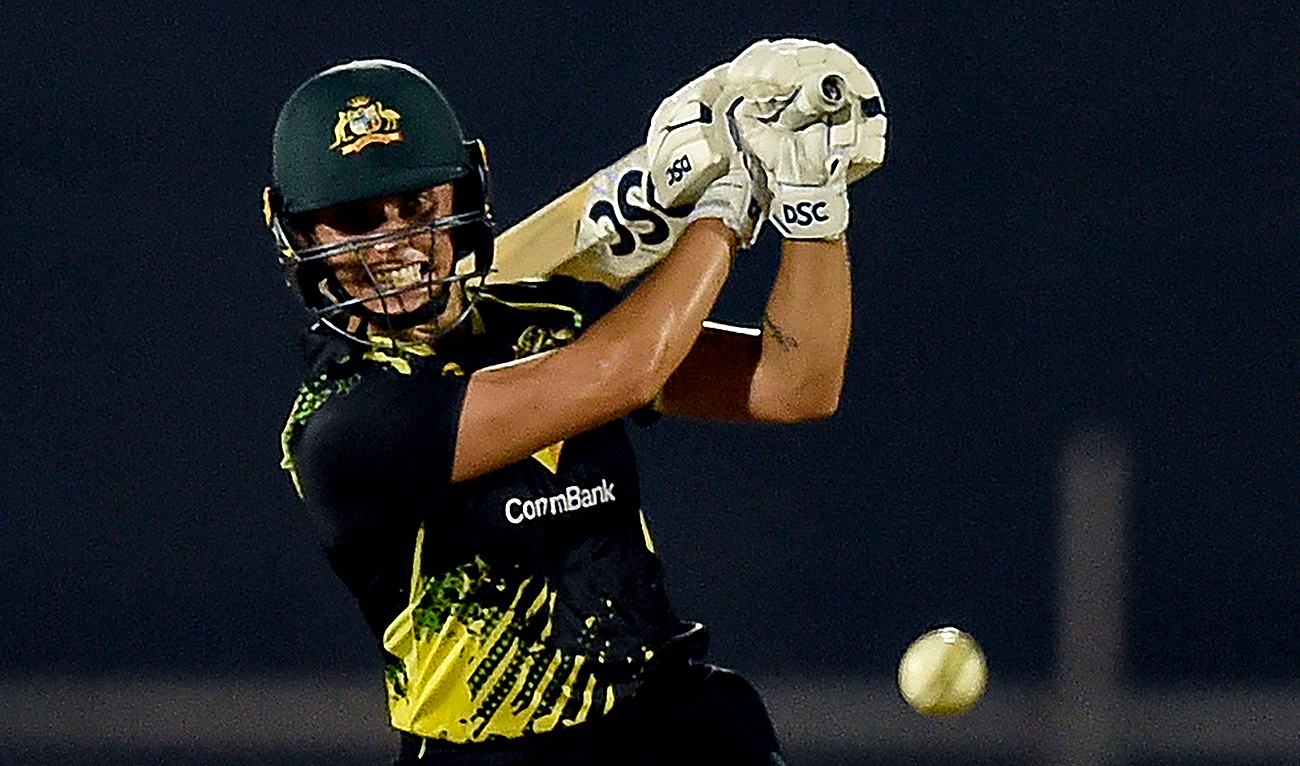 Australia's Ashleigh Gardner plays a shot during the fifth women’s T20 cricket match between India and Australia at the Cricket Club of India stadium in Mumbai on December 20, 2022. (Photo courtesy: AFP/File)