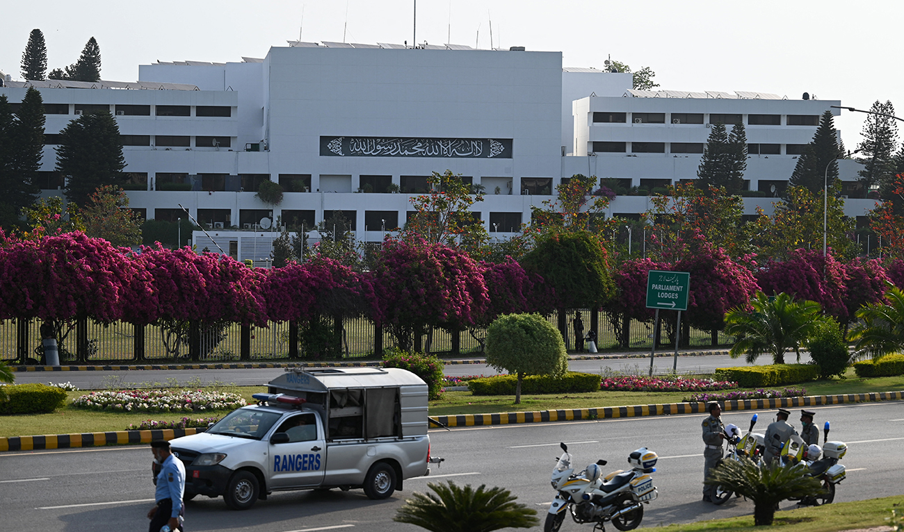 Security personnel patrol outside the Parliament House building in Islamabad on April 9, 2022. (Photo courtesy: AFP)