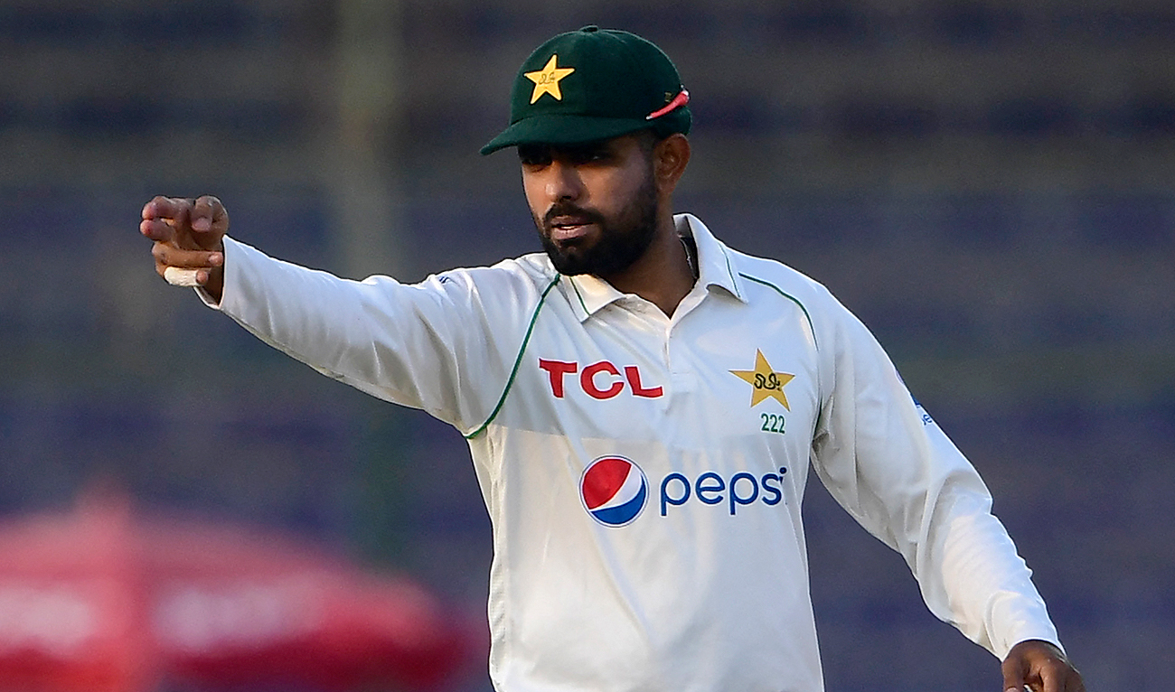 Pakistan's captain Babar Azam gestures during the third day of the first Test match between Pakistan and New Zealand at the National Stadium in Karachi on December 28, 2022. (Photo courtesy: AFP)