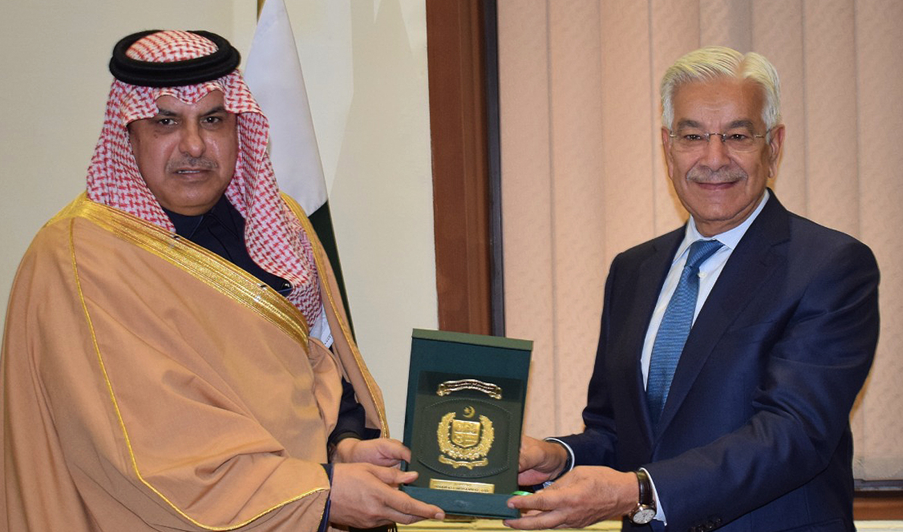 A handout picture provided by the Pakistani defense ministry shows defense minister Khawaja Asif (right) presenting a shield to Saudi Assistant Defense Minister Engr. Talat Abdullah Alotaibi (left) in Rawalpindi on January 25, 2023. (Photo courtesy: Ministry of Defense)