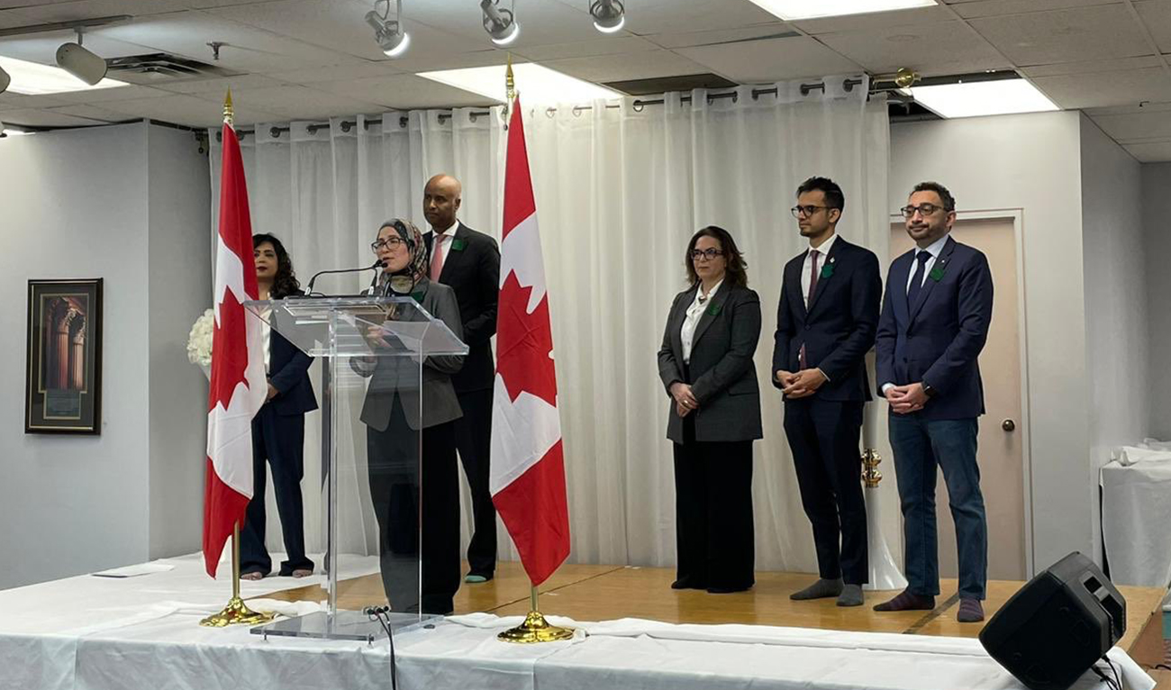 Journalist and activist, Amira Elghawaby (second left) delivers a speech after being appointed as Canada's special representative on combatting Islamophobia in Ottawa, Canada, on January 26, 2023. (Photo courtesy: @OmarAlghabra/Twitter)