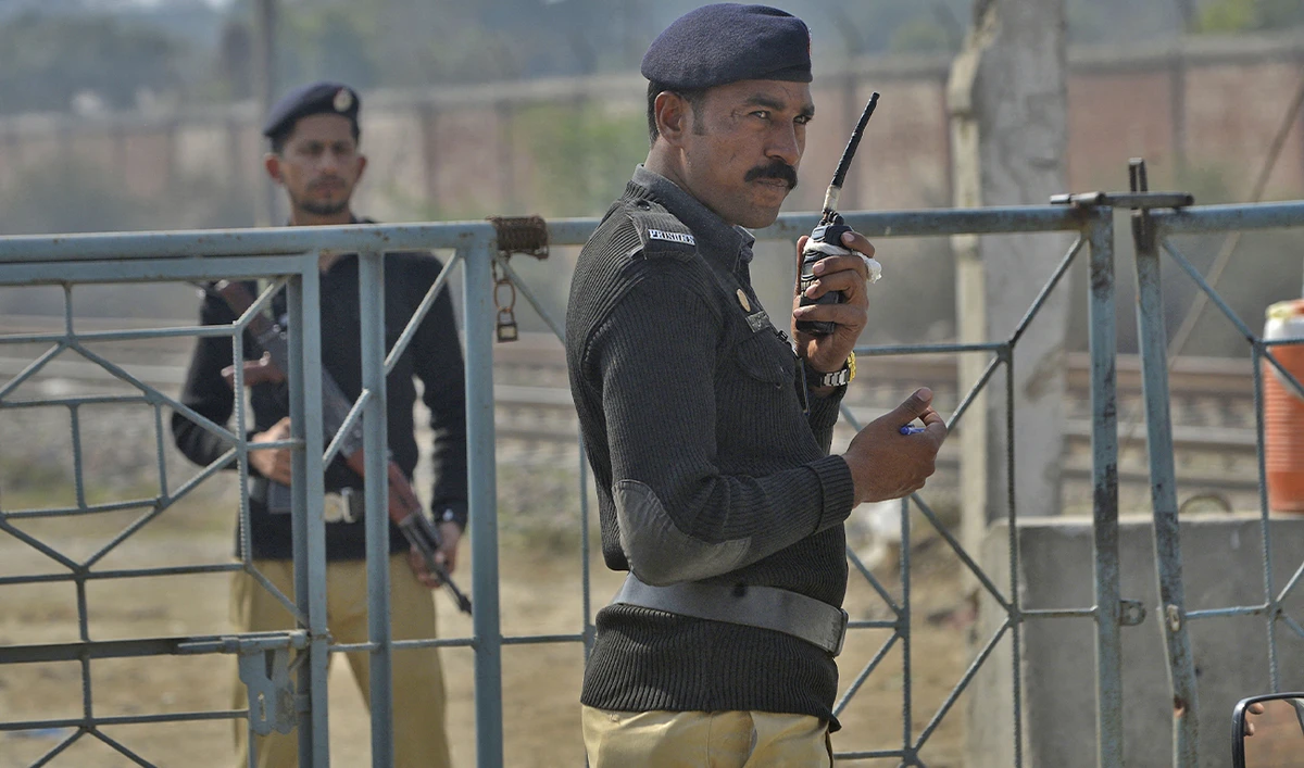 Pakistani policemen stand guard outside the check point in Lahore, Pakistan, on February 10, 2018. (AFP/File)