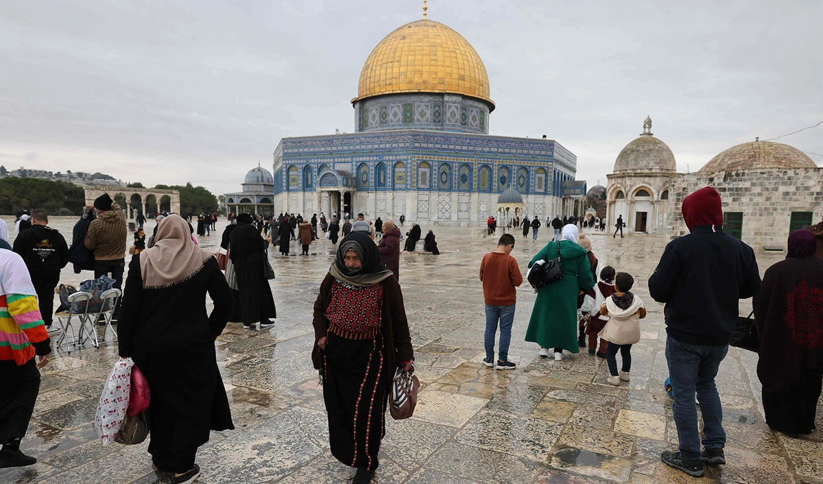 Palestinians gather in the Al-Aqsa mosques compound after the Friday noon prayer in Jerusalem on January 6, 2023. (AFP)