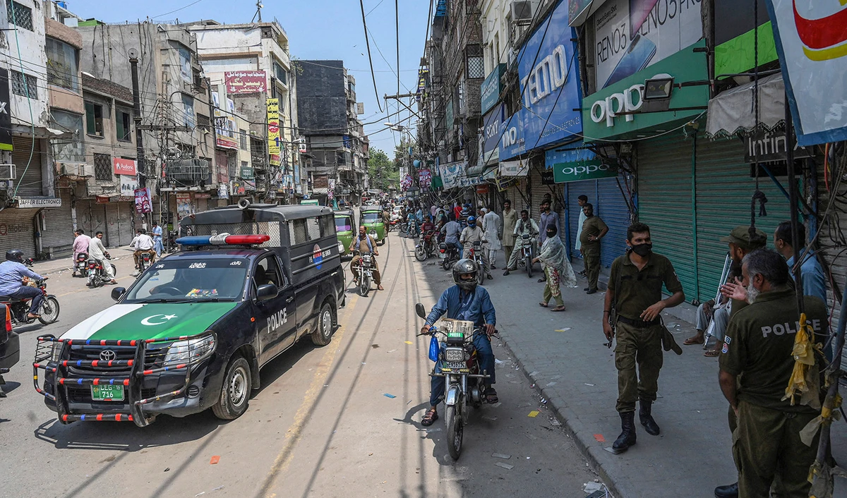 Policemen patrol on the streets of Lahore on July 28, 2020. (AFP/File)