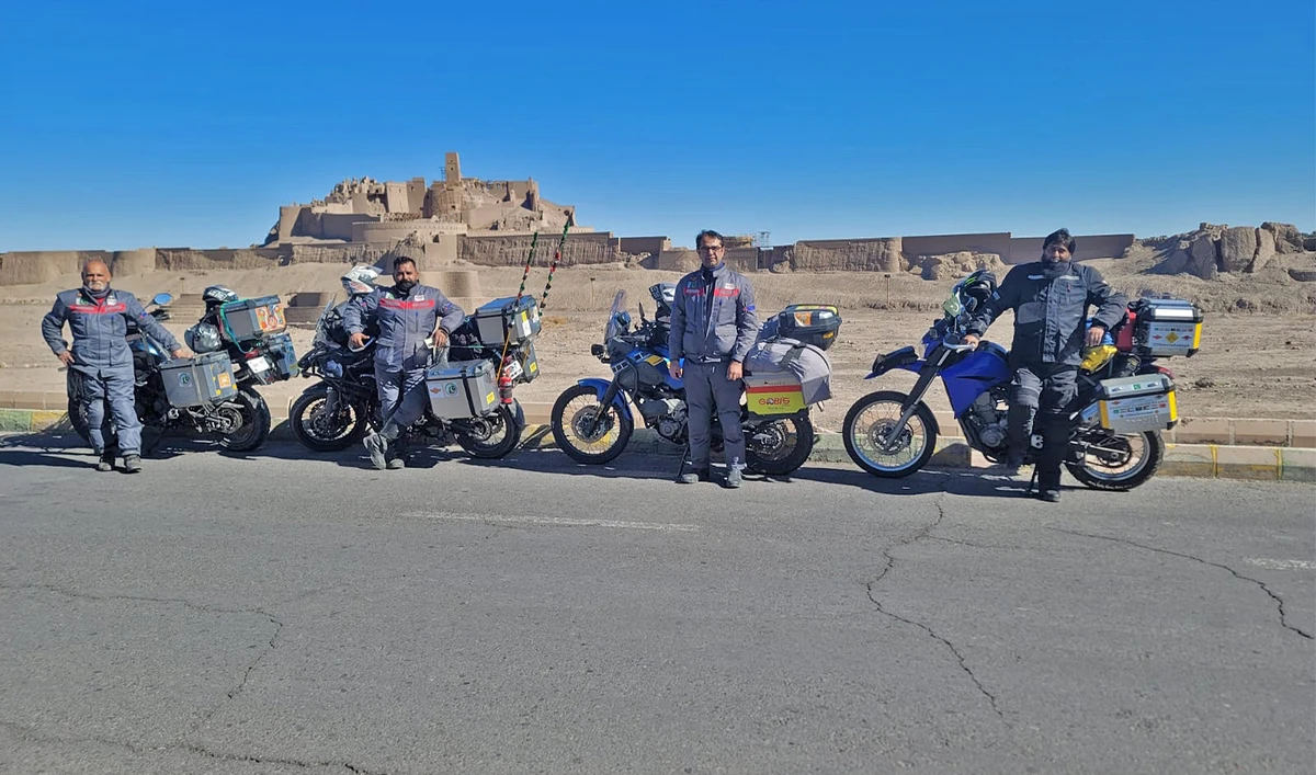 Pakistani bikers travellng to Makkah to perform Umrah pose for a picture in Iran's Bam city on January 13, 2023. (Photo courtesy: Mukaram Tareen)