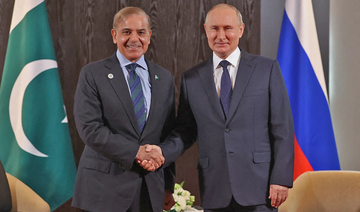 Russian President Vladimir Putin meets with Prime Minister of Pakistan Shehbaz Sharif on the sidelines of the Shanghai Cooperation Organisation (SCO) leaders' summit in Samarkand on September 15, 2022. (AFP/File)