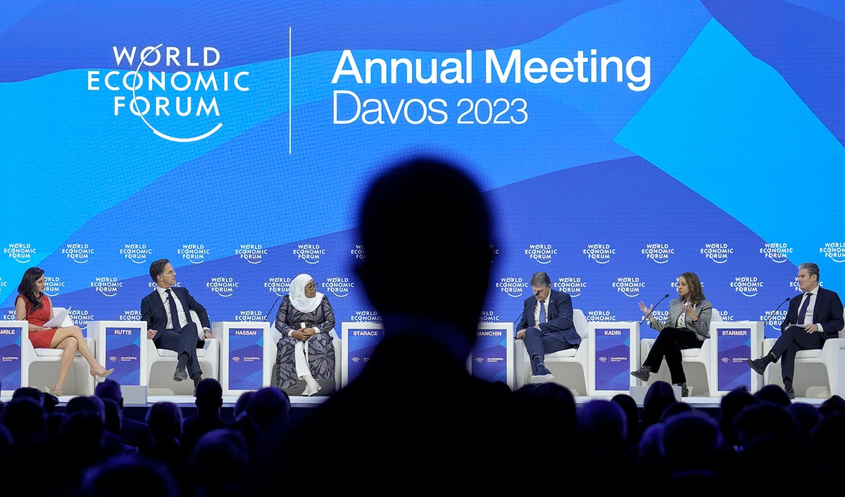 Panelists hold discussions on the podium at the World Economic Forum in Davos, Switzerland on January 19, 2023. (AP)