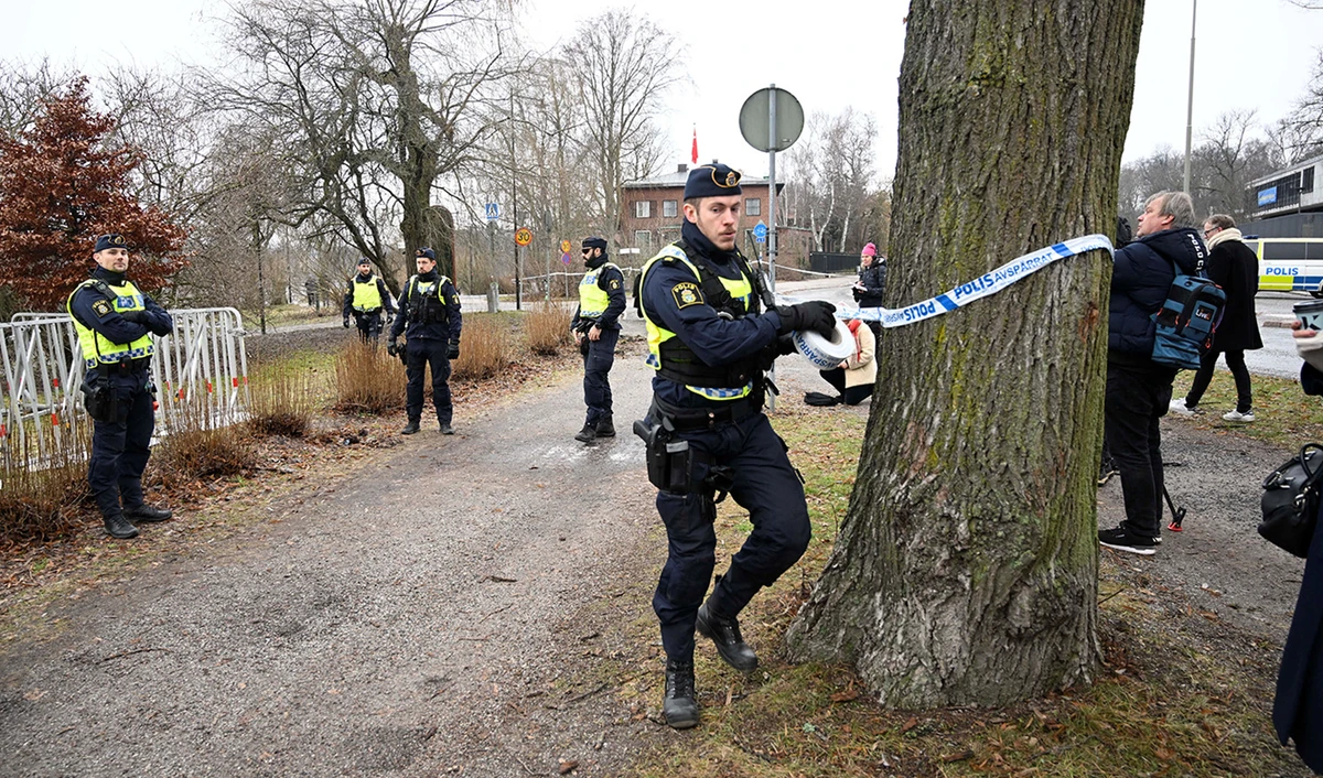 Police cordon off the area where leader of the far-right Danish political party Stram Kurs Rasmus Paludan has planned to hold a meeting outside the Turkish embassy in Stockholm, Sweden, on January 21, 2023. (TT News Agency via Reuters)