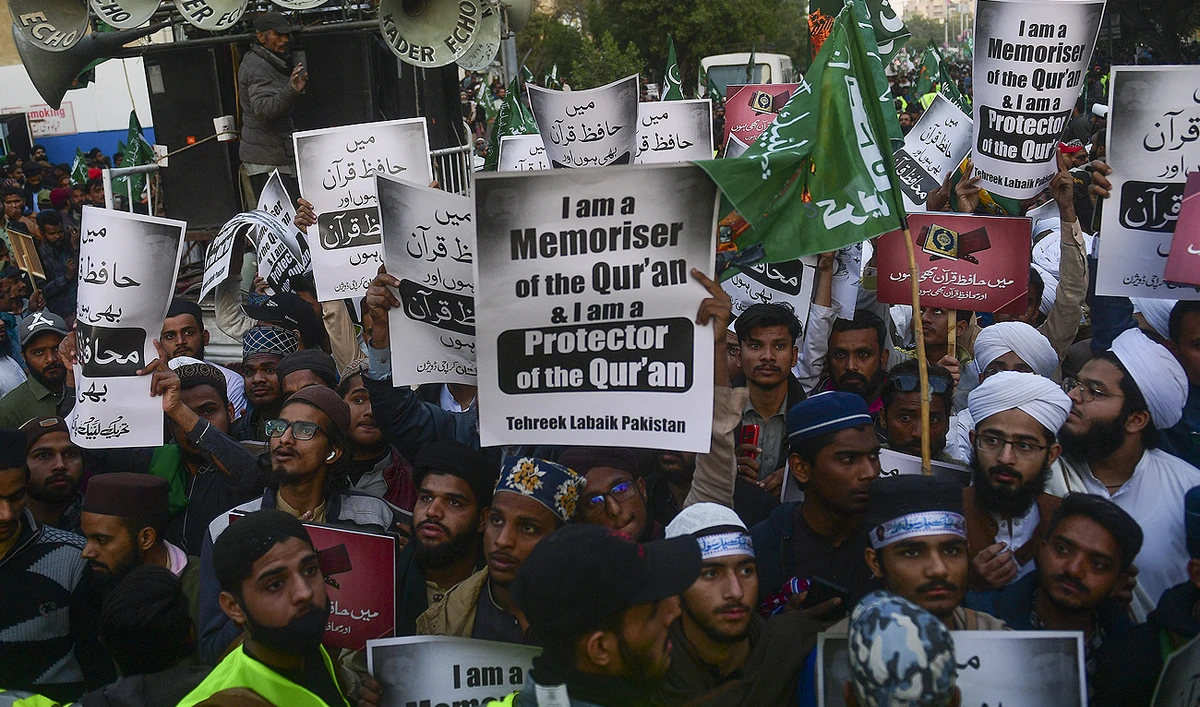 Demonstrators protest against the burning of the Koran in Sweden, in Karachi on January 27, 2023. (Photo courtesy: AFP)