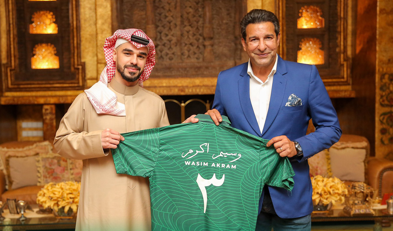 President of Saudi Arabian Cricket Federation Saud bin Mishal, left, presents a special jersey to Pakistan cricket legend Wasim Akram in Riyadh on February 2, 2023. (Photo courtesy: @cricketsaudi/Twitter)