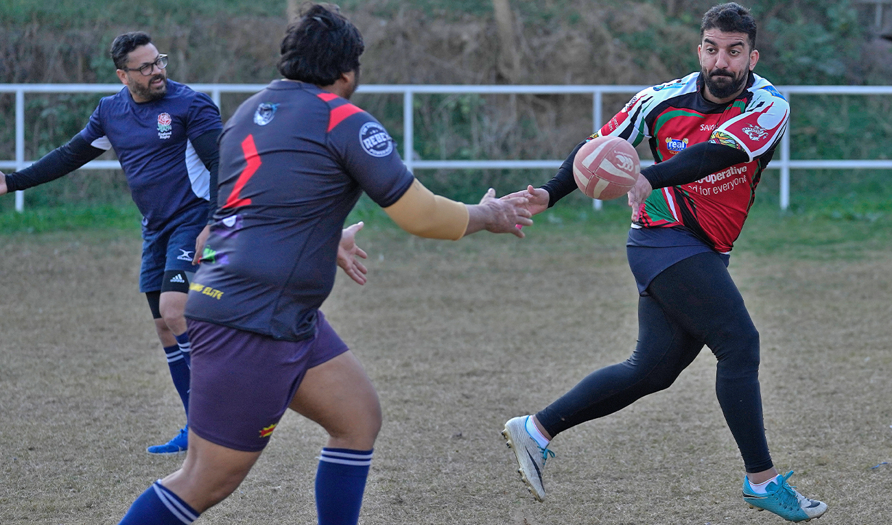 Rugby players of a local club 'Islamabad Jinns' take part in a practice session, in Islamabad, Pakistan, on December 17, 2022. (AP)