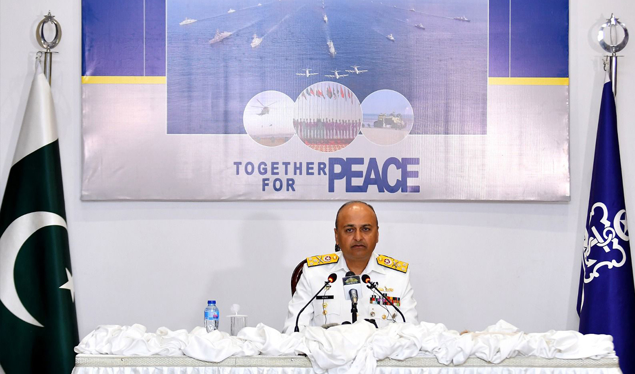 Vice Admiral Ovais Ahmed Bilgrami, Commander Pakistan Fleet, addressing media during the opening brief of the multinational maritime exercise AMAN-23 in Karachi on February 8, 2023. (Photo courtesy: Pakistan Navy)
