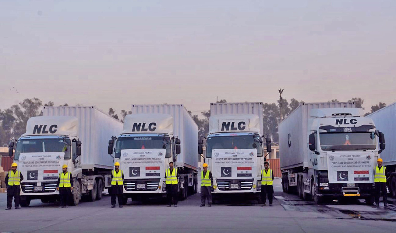 The picture shared on February 11, 2023, shows Pakistani containers carrying relief goods to earthquake-hit Turkiye and Syria in Lahore, Pakistan. (Photo courtesy: PID)