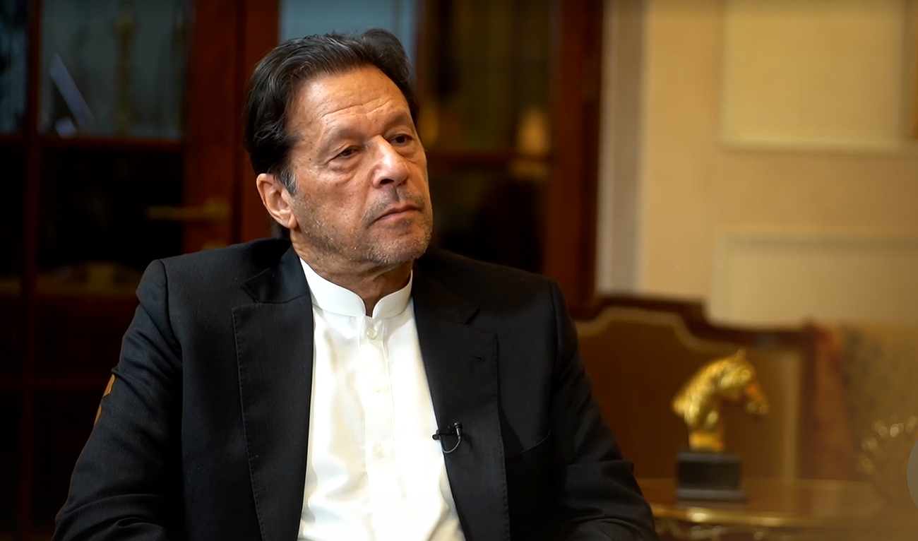 In this screengrab taken from a video on February 12, 2023, Pakistan's former prime minister Imran Khan gestures during an interview with Voice of America in Lahore. (Photo courtesy: VOA)