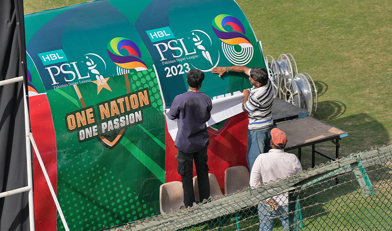 Workers decorate an enclosure at the National Stadium in preparation for upcoming Pakistan Super League, in Karachi, Pakistan, on February 11, 2023. (AP)