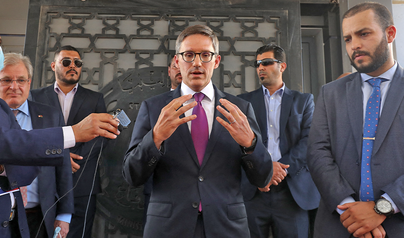 US envoy Derek Chollet (C) speaks to the media in the capital Tripoli, Libiya, on September 15, 2021. (AFP/File)
