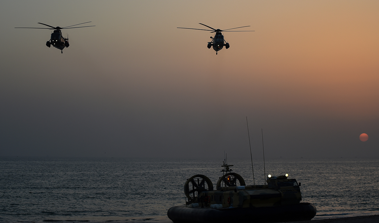 Special Services Group navy commandos take part in the navy's Multinational Exercise 'AMAN-19' in sea view in Karachi on February 9, 2019. Exercise Aman is scheduled from February 8 to 12, 2019, in which over 45 countries are participating with ships and observers. (AFP)