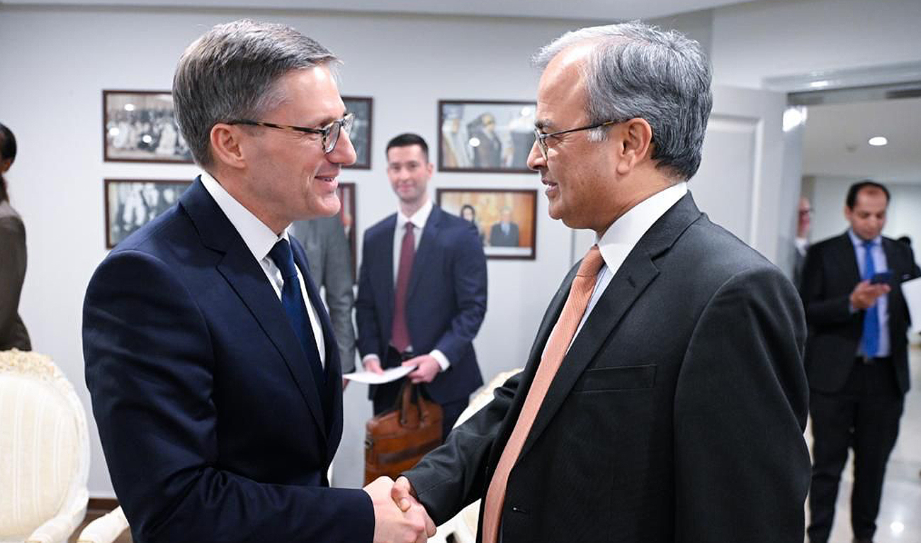 In this handout picture, released by Pakistan Foreign Office on February 16, 2023, Foreign Secretary Dr. Asad Majeed Khan (right) receives US Department of State Counselor Derek Chollet (left) at the Ministry of Foreign Affairs. (Photo courtesy: Twitter/ForeignOfficePk)
