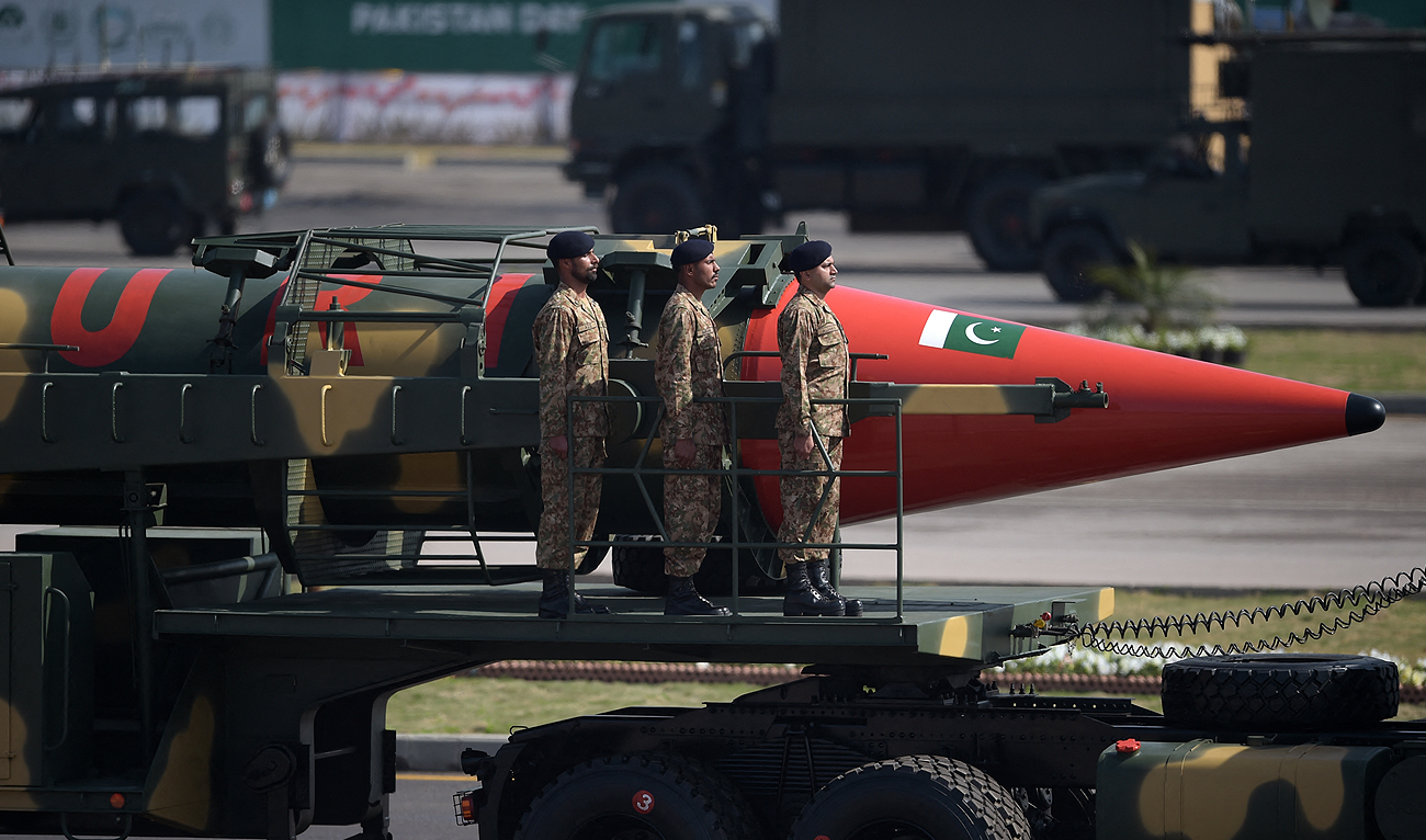 In this file photo taken on March 23, 2017, Pakistani military personnel stand beside a Ghauri nuclear-capable missile during a Pakistan Day military parade in Islamabad. (Photo courtesy: AFP/File)