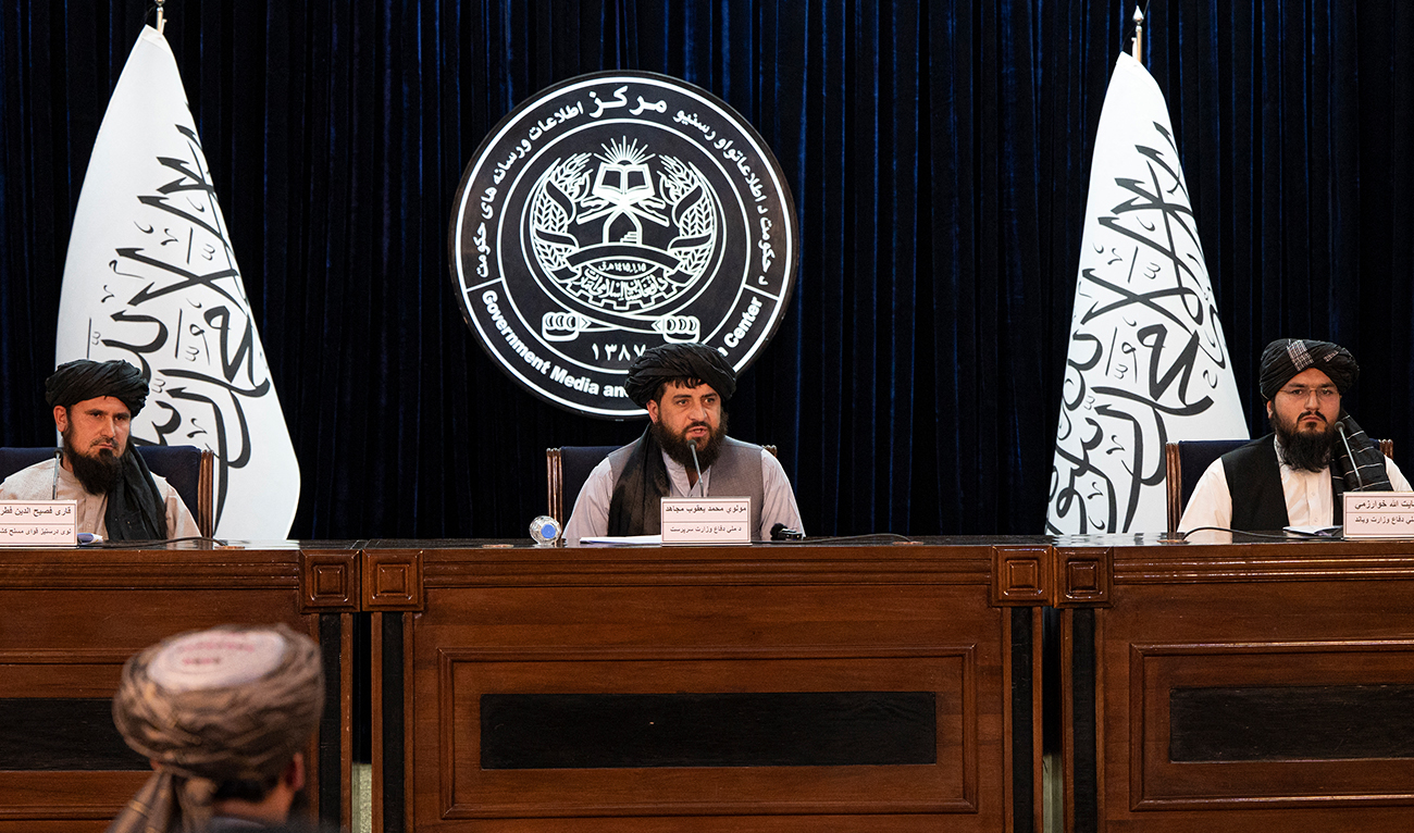 The army chief of staff Qari Fasihuddin Fitrat (L), acting defence minister of Afghanistan Mohammad Yaqoob Mujahid (C) and Taliban defence ministry spokesman Enayatullah Khawarizmi speak during a press conference in Kabul on August 28, 2022. (Photo courtesy: AFP/FILE)
