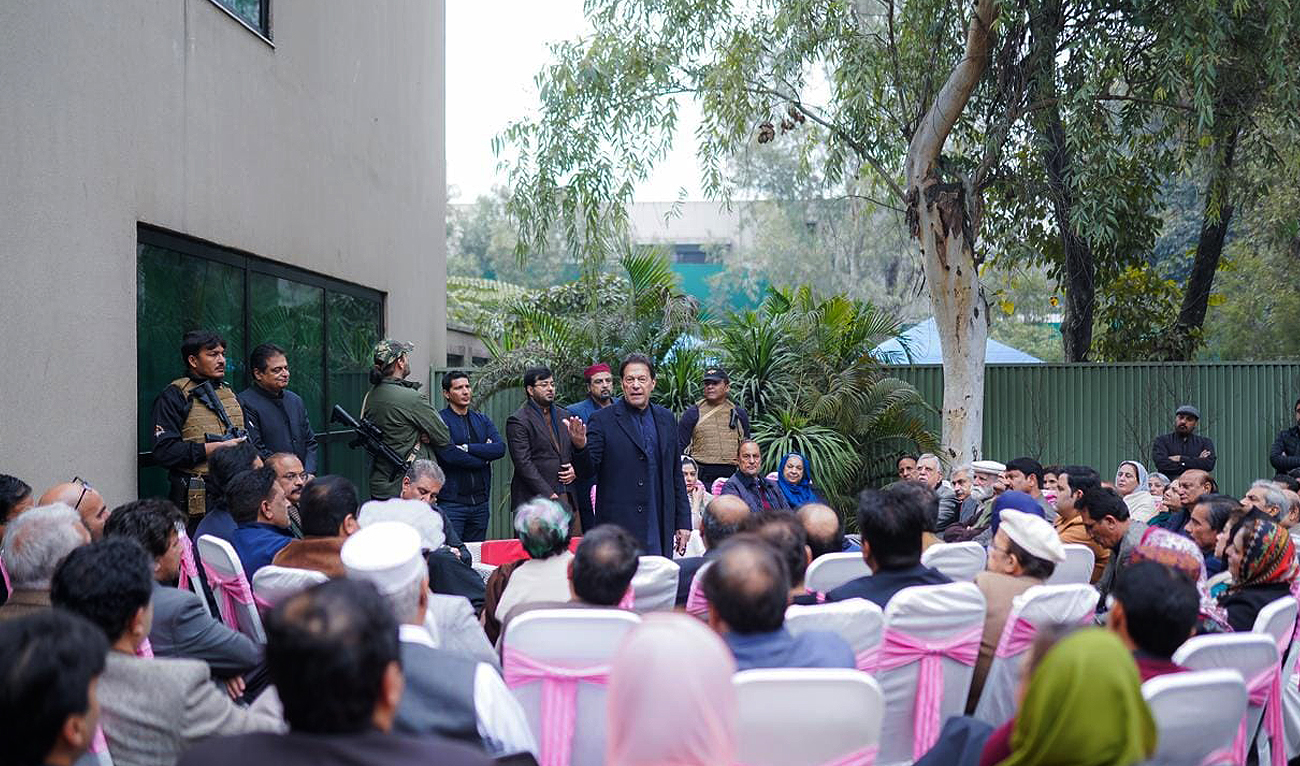 Pakistan's former prime minister Imran Khan gestures during his political party meeting in Lahore on January 29, 2023. (Photo courtesy: Twitter/ImranKhanPTI)