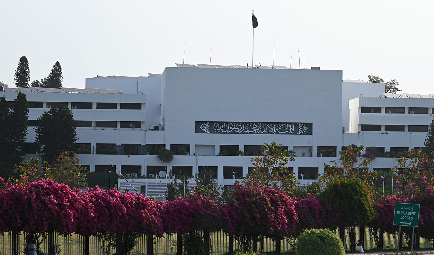 Security personnel patrol outside the Parliament House building in Islamabad, Pakistan, on April 9, 2022. (AFP/File)