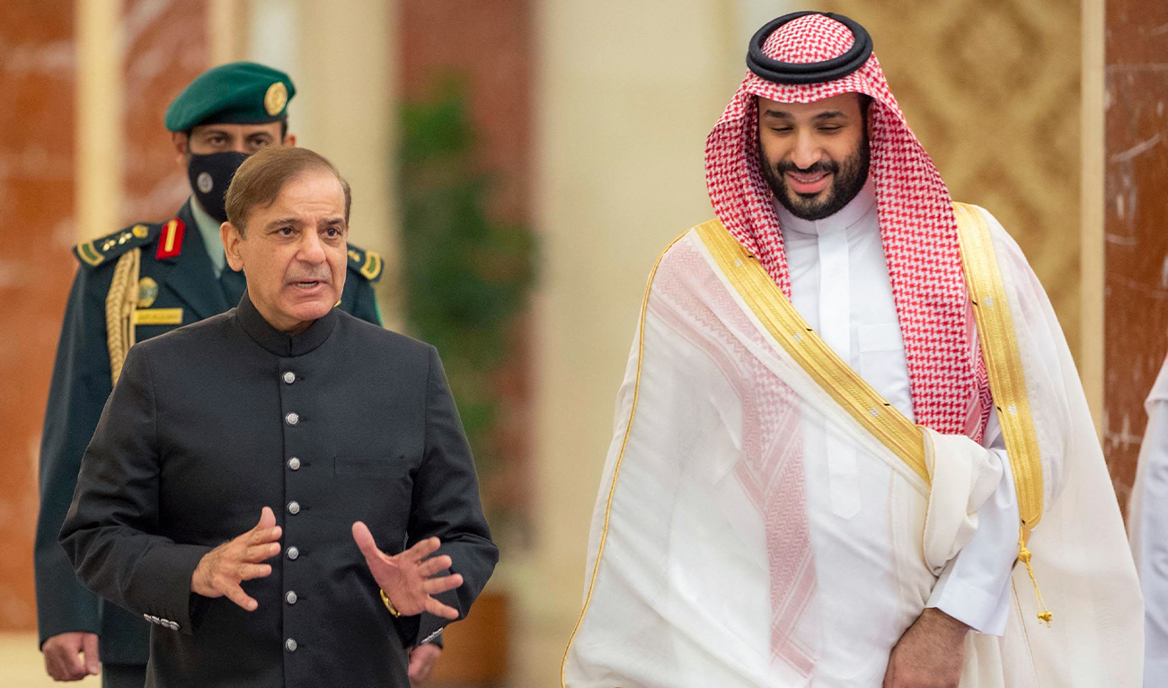 A handout picture provided by the Saudi Royal Palace shows Saudi Arabia's Crown Prince Mohammed Bin Salman (R) welcoming Pakistani Prime Minister Shehbaz Sharif in Jeddah on April 30, 2022. (AFP/File)
