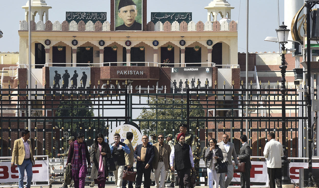 A delegattion led by Indian Indus Water Commissioner Pradeep Kumar Saxena (2L) cross the India-Pakistan Wagah Border post, some 35 km from Amritsar on March 4, 2022, after talks in Pakistan with their Pakistani counterparts led by Syed Muhammad Mehr Ali Shah. (Photo courtesy: AFP/FILE)