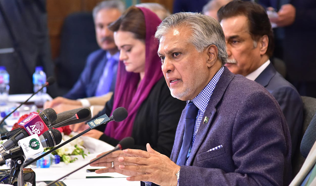 Pakistan finance minister Ishaq Dar gestures during a press briefing in Islamabad on January 4, 2023. (Photo courtesy: Twitter/FinMinistryPak)