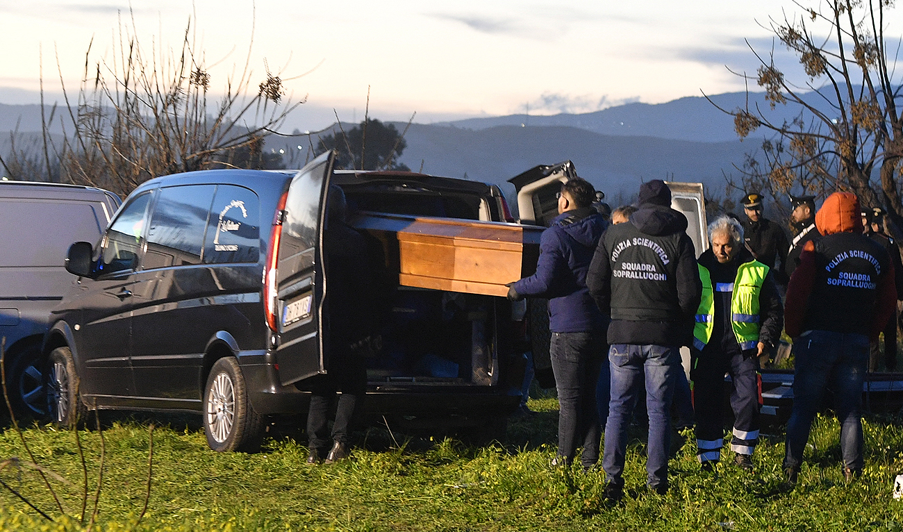 Funeral parlour employees load a coffin containing the body of a deceased migrant, into a van on February 26, 2023 near the beach of Steccato di Cutro, south of Crotone. (Photo courtesy: AFP)